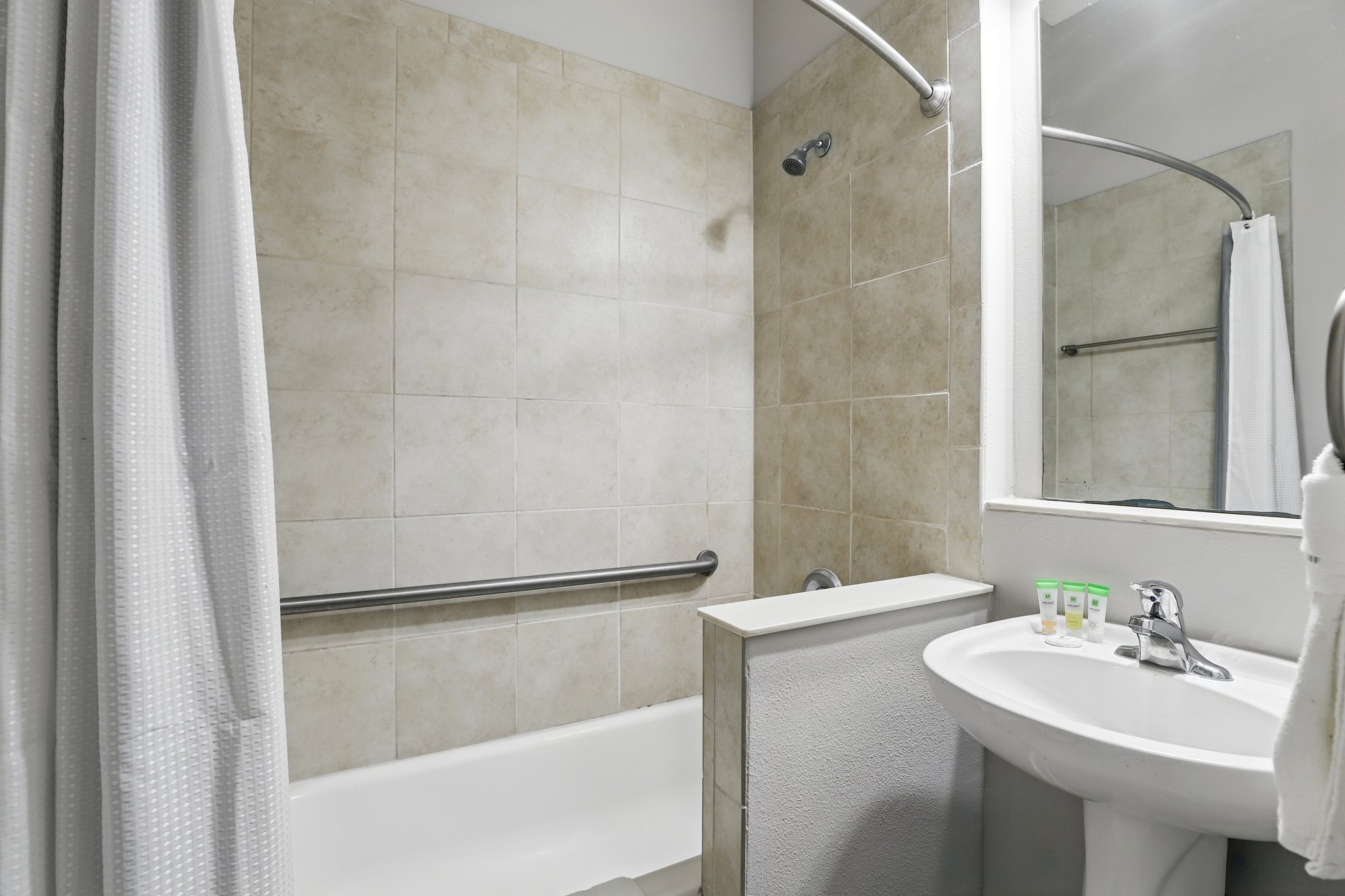 Guest bathroom with tiled tub