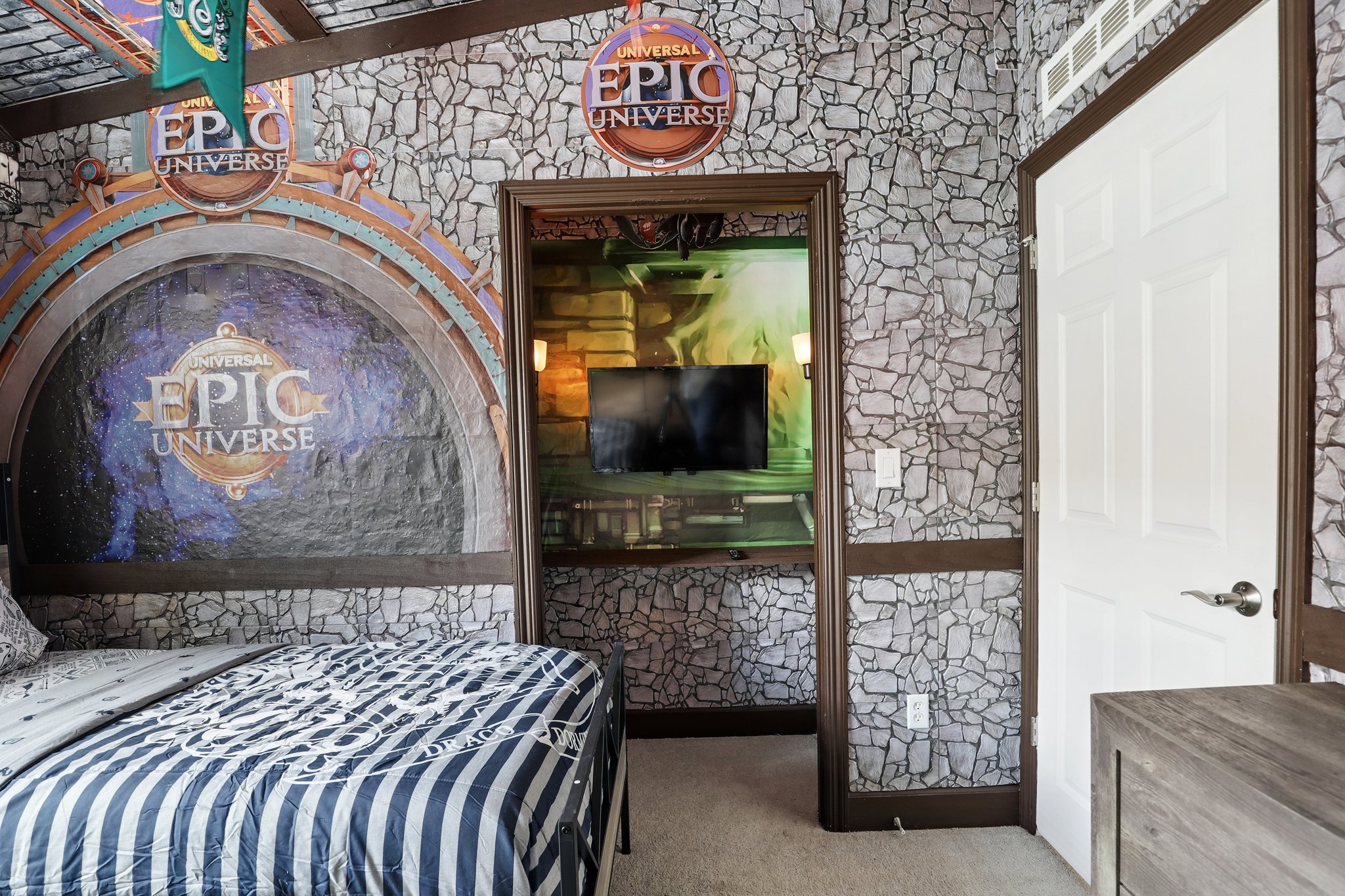 Wizarding-themed bedroom with stone wall
