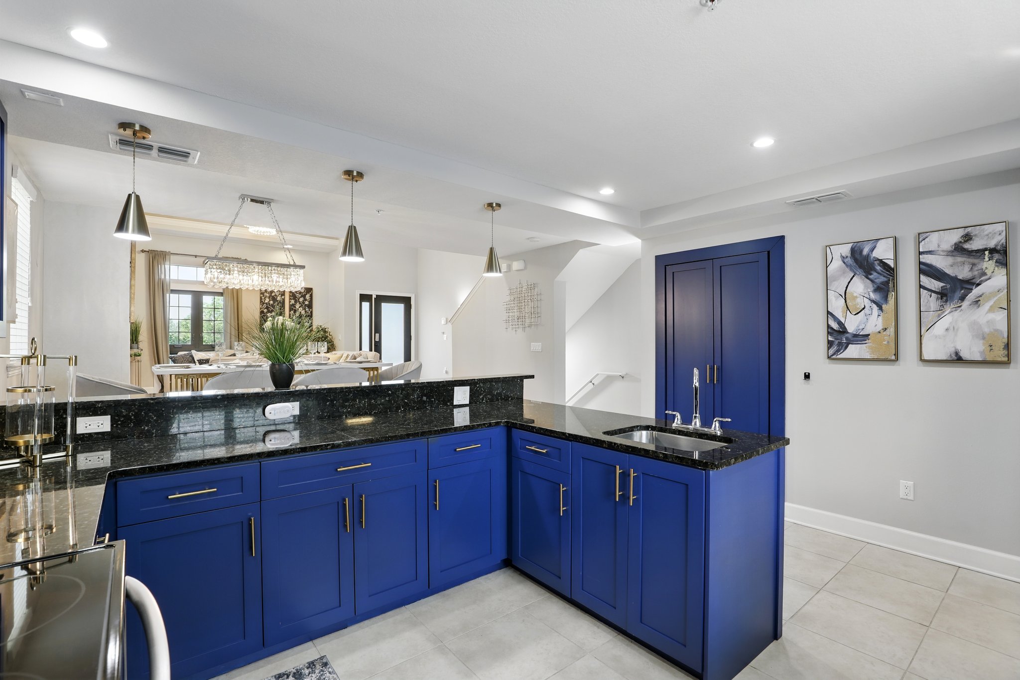 Wide kitchen view with stainless appliances