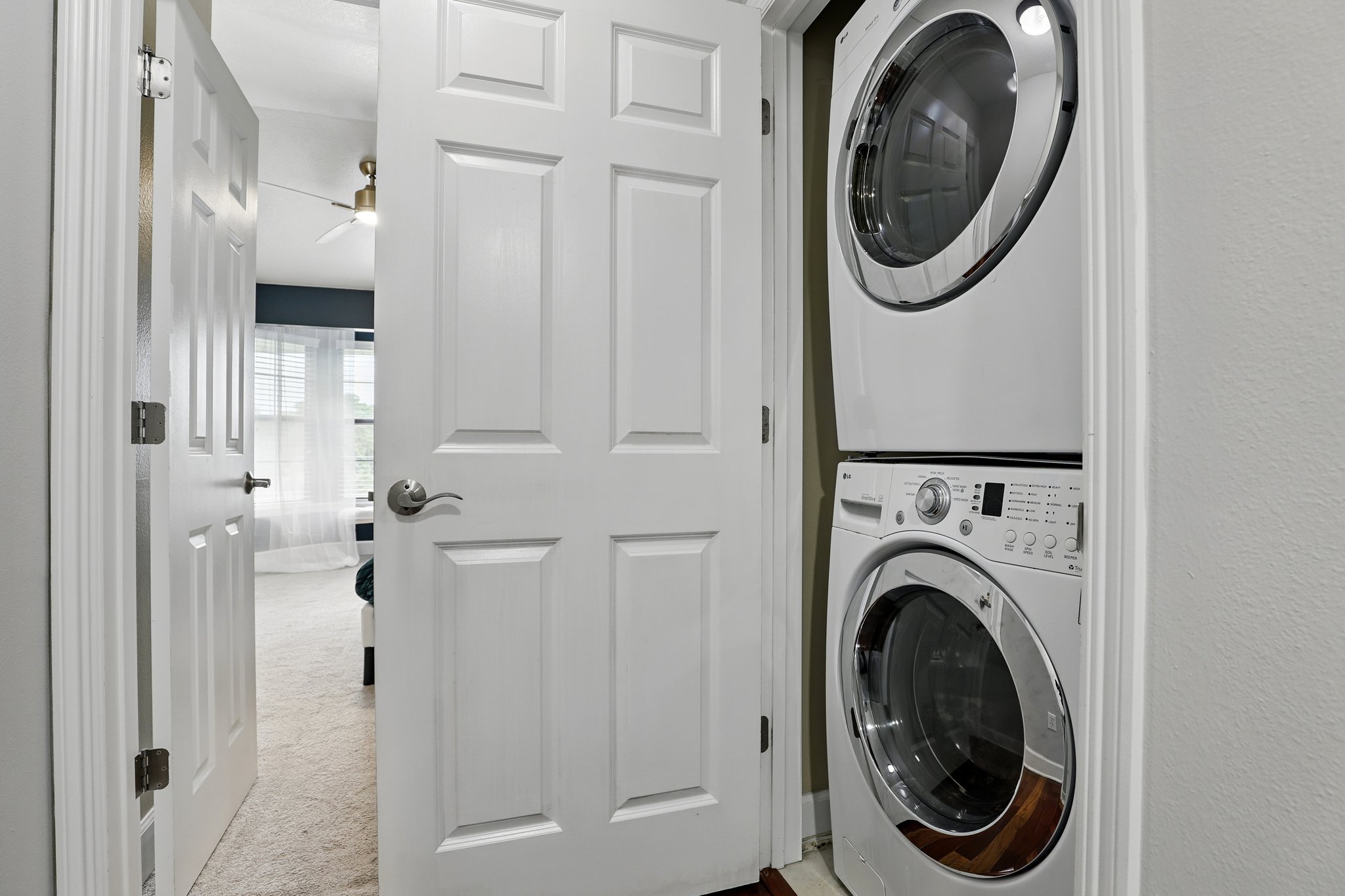 In-unit stacked washer and dryer